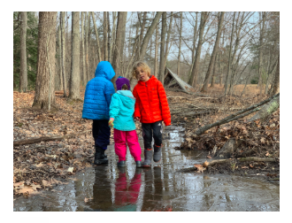 Playing with cousins out in the woods, on the ice and in the muck and inviting spore-based soil microbes into their micro biomes.