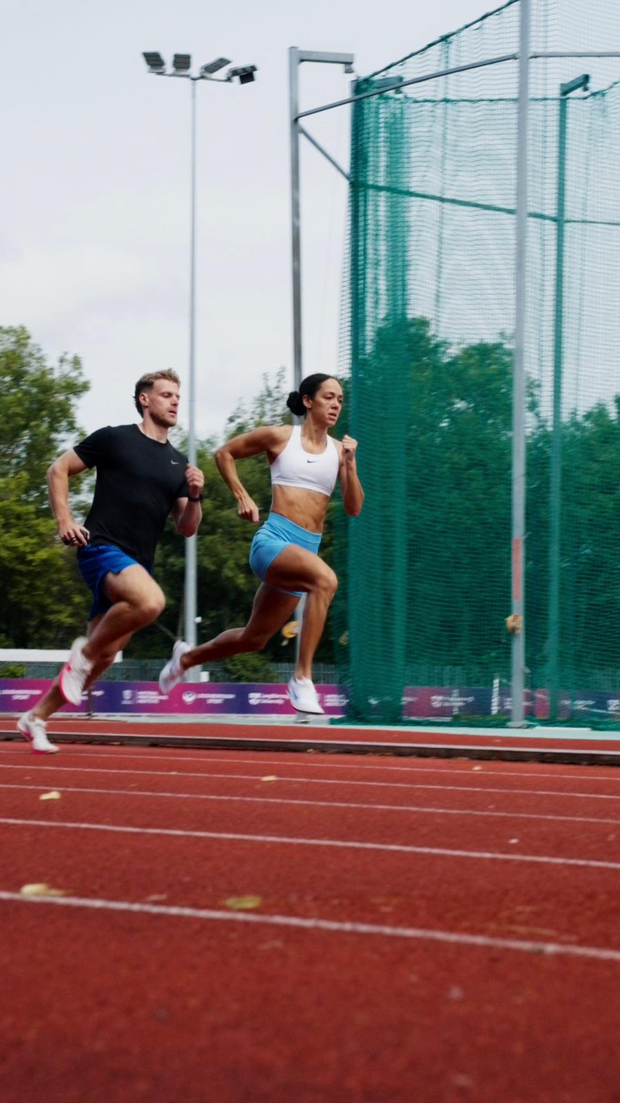 Joe Fuggle, founder of The Athlete Place, pacing World Champion Katarina Johnson-Thompson