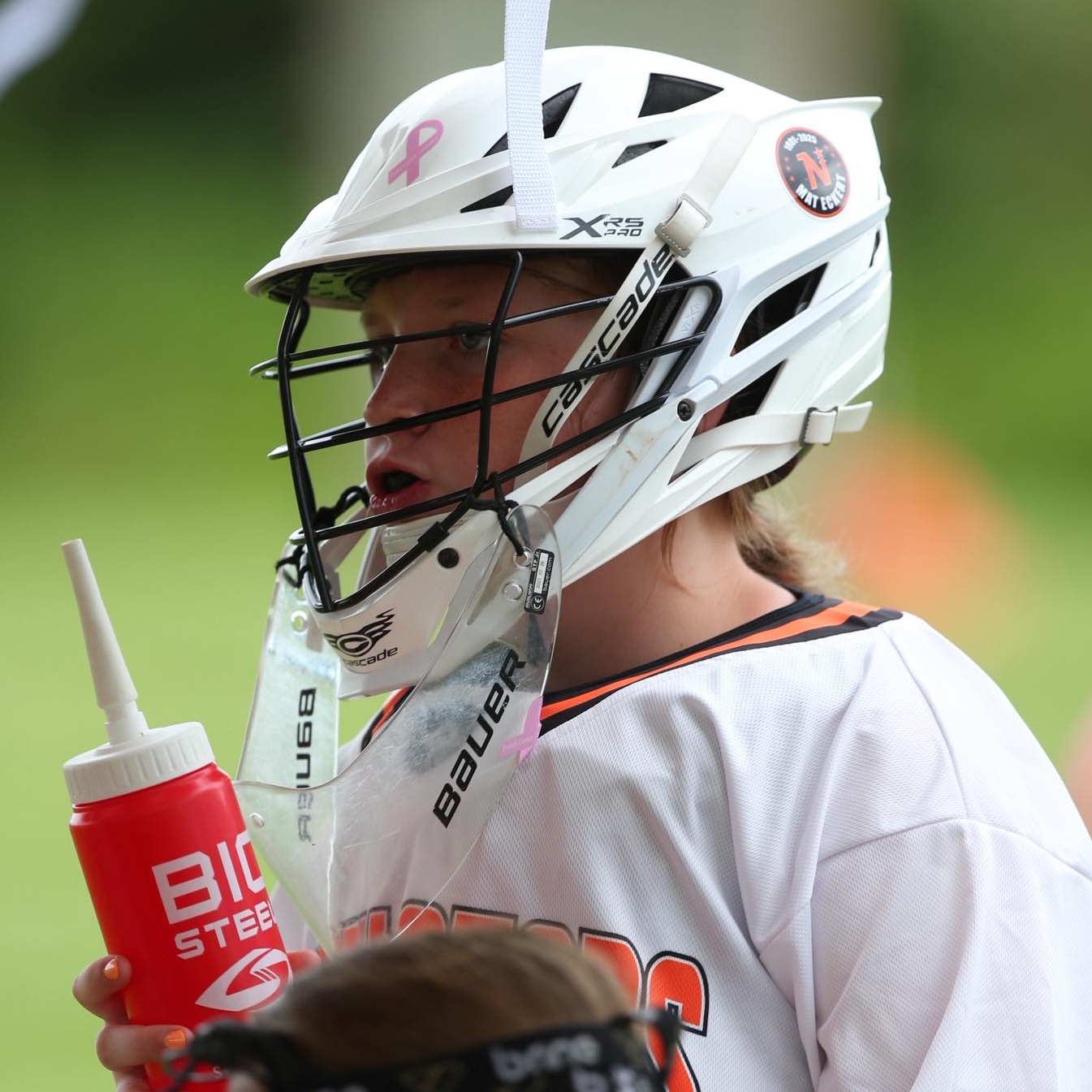 Youth lacrosse goalie in action