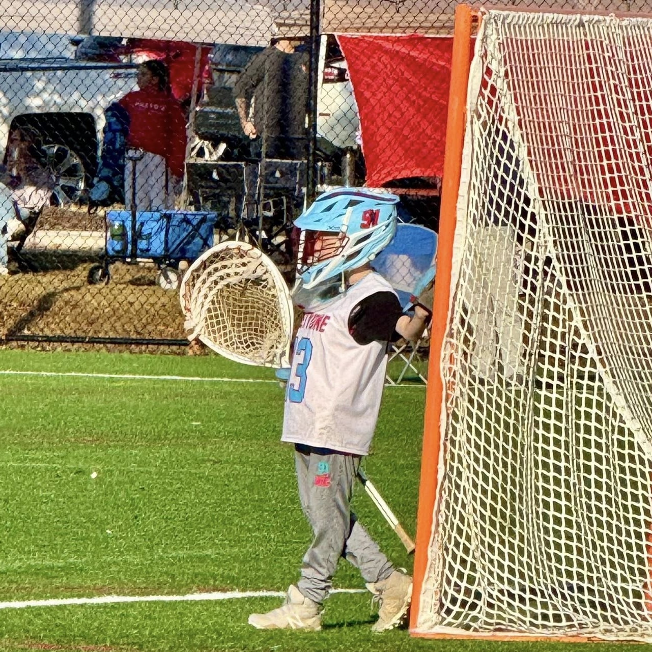 Youth lacrosse goalie ready stance