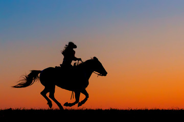 A woman working with a horse on the ground at an equine-facilitated learning workshop in Southern Oregon. No riding is involved.
