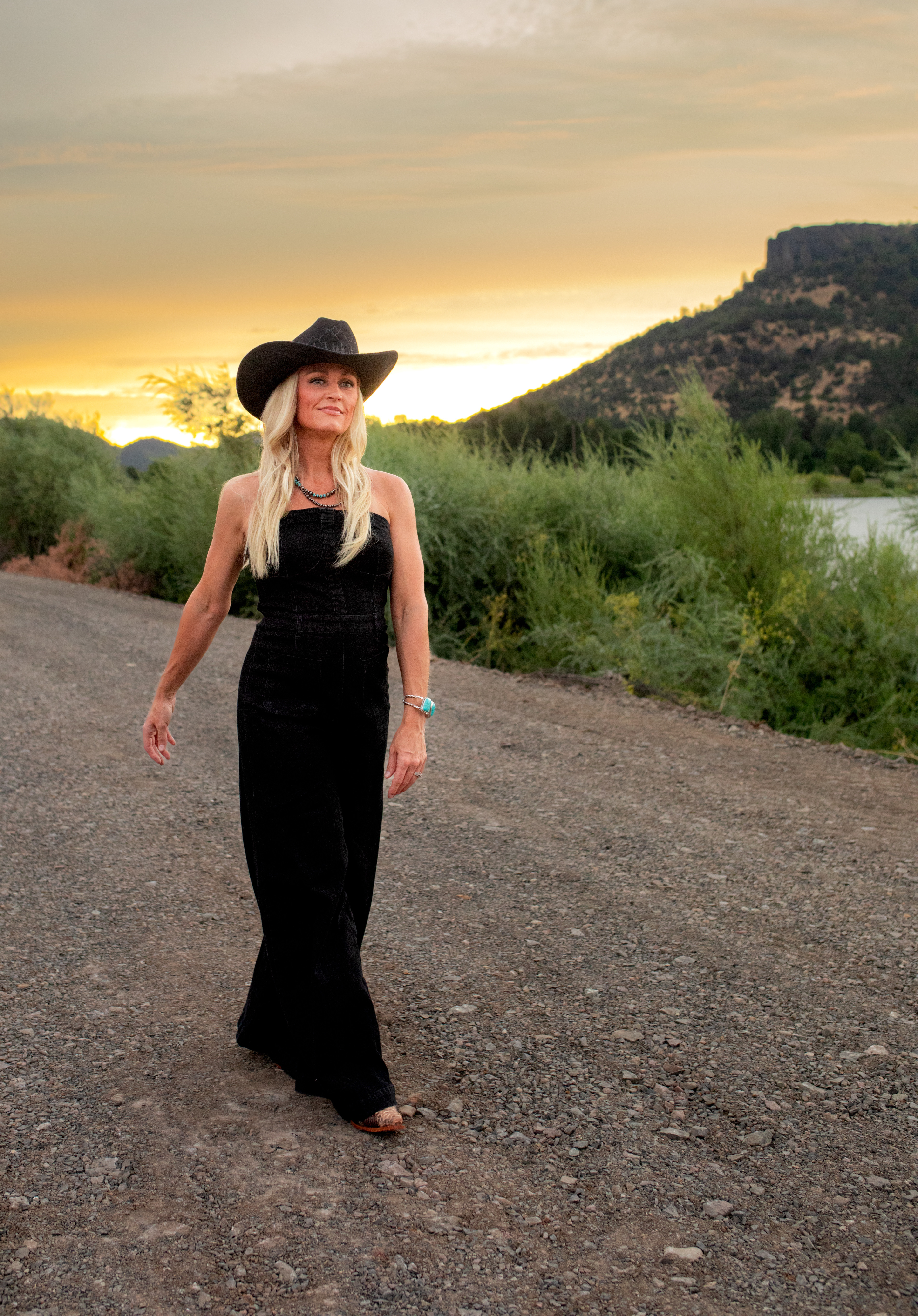 Sausha Davis at sunset on the ranch