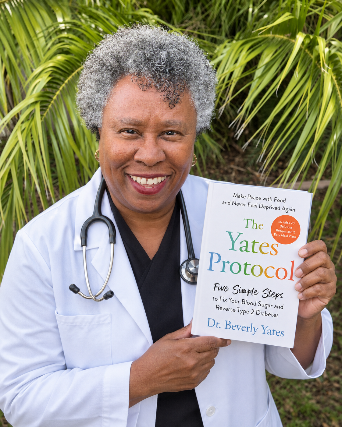 Dr. Beverly Yates, ND holding her book, The Yates Protocol