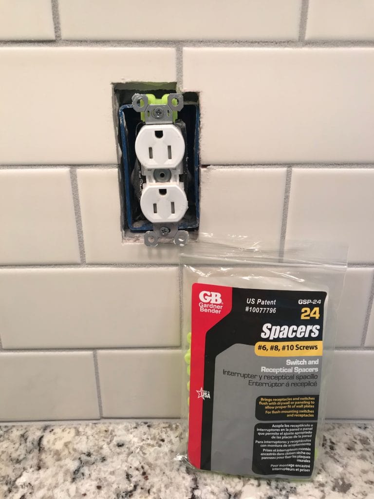 plastic wall plate spacers for outlet with DIY backsplash 