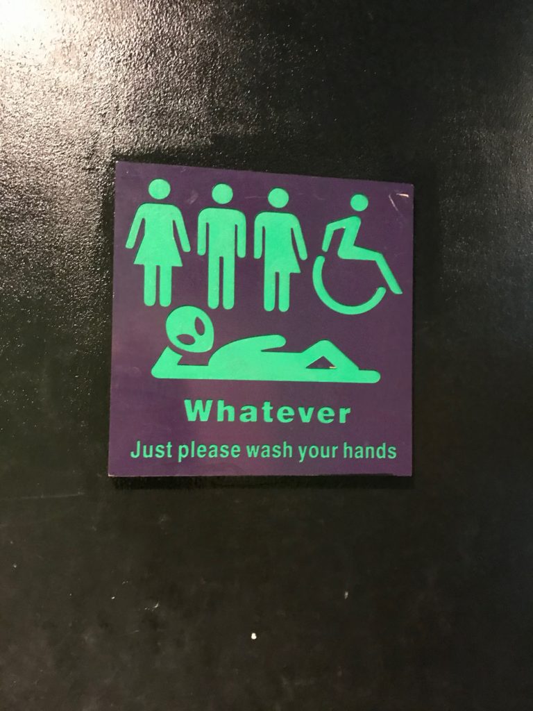 Friendly toast bathroom sign