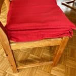 Stack some cushions to increase chair height