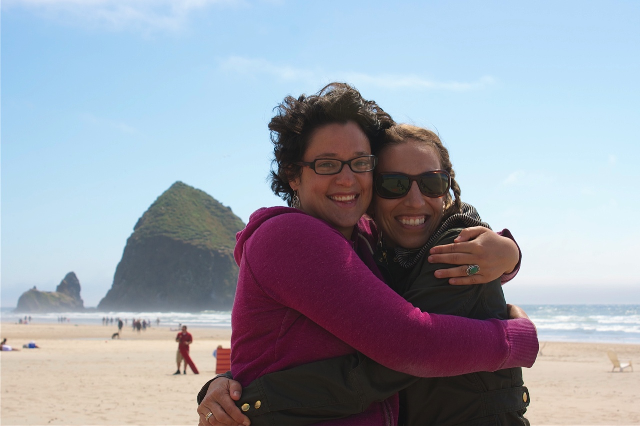 Sarah and Hannah beach hug